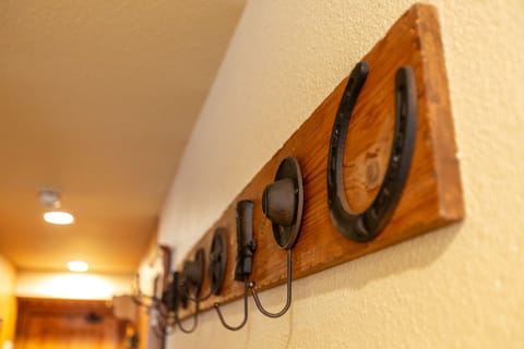 Plenty of hanging racks for clothes and ski wear.