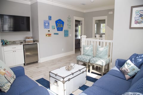 3rd floor rec room, bedroom and bath offer a private space for young families.