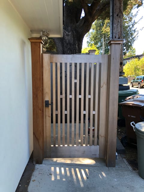 This is the guest house gate on the far right of the driveway near the mailboxes