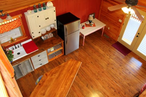 Looking down at the kitchen area from the loft area.