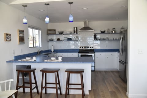 Completely redone kitchen with a farmers sink and all stainless appliances