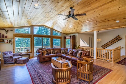 Great Room on top floor, front deck, steps leading to bottom floor