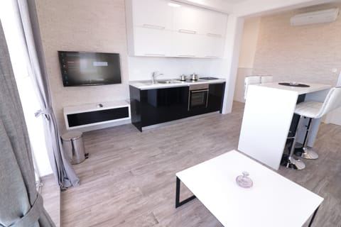 Deluxe Apartment, 2 Bedrooms, Terrace (B6) | Living area | Flat-screen TV
