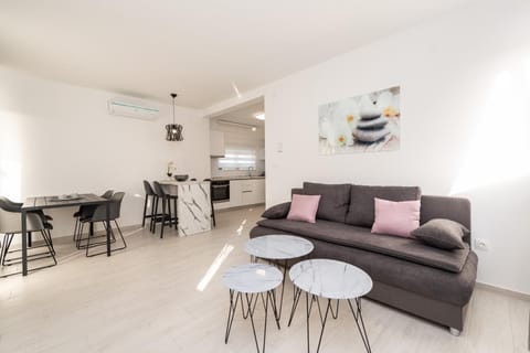 Apartment, 1 Bedroom, Terrace | Living room | 45-inch flat-screen TV with cable channels