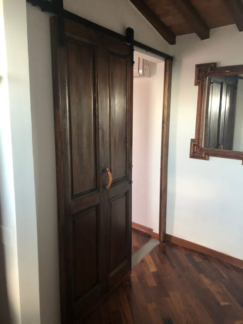Barndoor entrance to master bedroom
