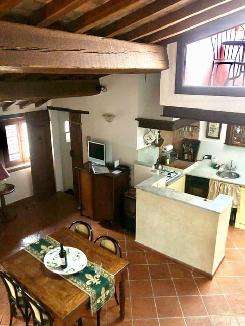 View of kitchen alcove from stairway to masterbedroom