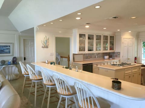 Kitchen w/ SS appliances, incl. double ovens, gas cooktop, ice maker, fridge