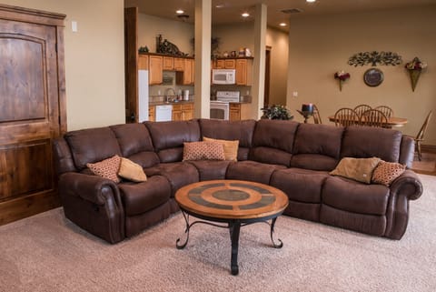 Family Room with TV and picture windows to the lake