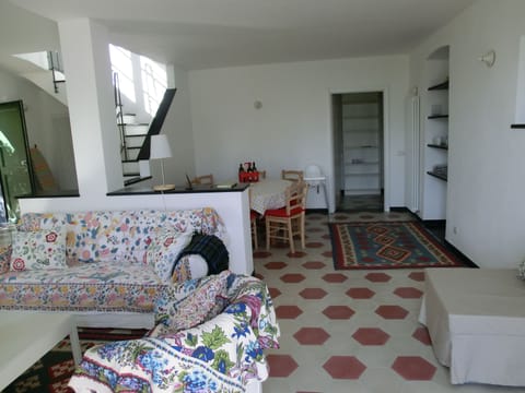 dining table for 8, stairs up to bedrooms,1 double bed with en-suite bath thru'