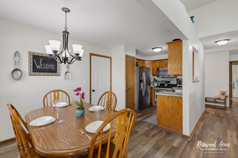 Eat in kitchen has extra chairs in case your family needs extra seating