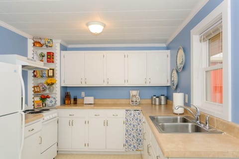KITCHEN - Includes dishwasher, garbage disposal, stove, oven, microwave, fridge.