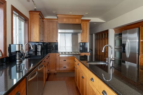 Professional Kitchen stainless with granite countertops.  Cooking with Friends