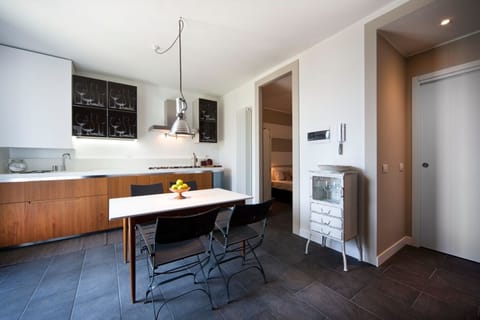 Kitchen and hallway in front of second master floor bathroom