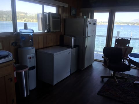 Fridge, freezer, water cooler and ice maker. 