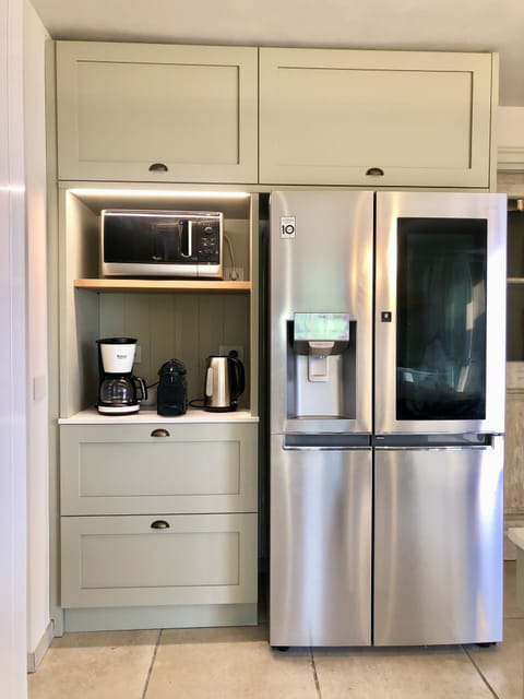 LG fridge, Nespresso machine, microwave, kettle, American coffee maker