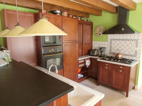 Kitchen, ground floor open to the living room and dining area