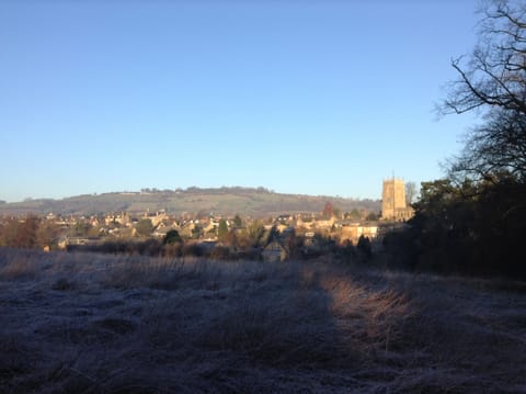 A view over WInchcombe taken from Vineyard Street by the gates to Sudeley Castle
