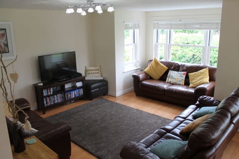 Large comfortable lounge area, with reclining sofa for added comfort.
