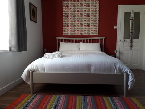 First floor: the Red Bedroom with kingsize bed