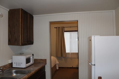 Deluxe Room, 2 Queen Beds | Private kitchen | Mini-fridge, microwave