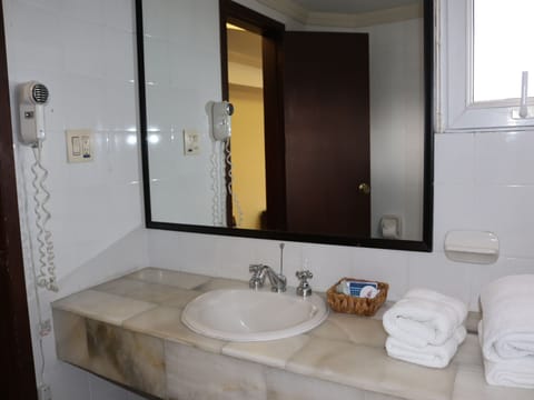 Standard Double Room | Bathroom | Combined shower/tub, deep soaking tub, eco-friendly toiletries