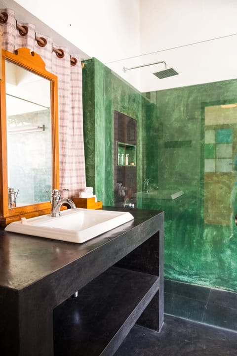Green & Black Room | Bathroom | Shower, designer toiletries, hair dryer, slippers