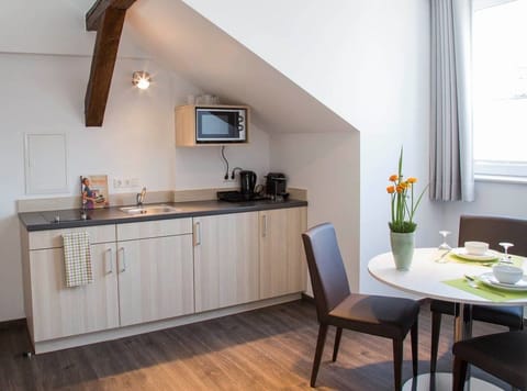 Junior Suite | Private kitchen | Fridge, microwave, electric kettle