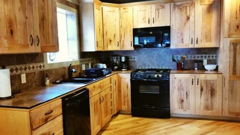 Kitchen with bay window and appliances
