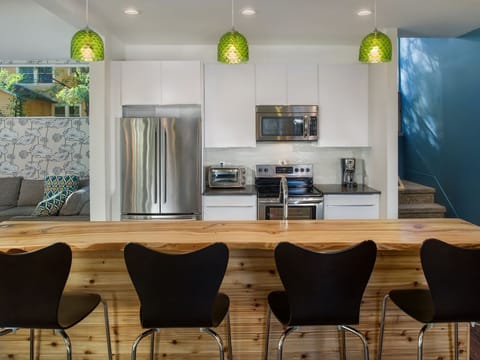 Ice maker, microwave, toaster, blender, coffee grinder/maker, and good knives!