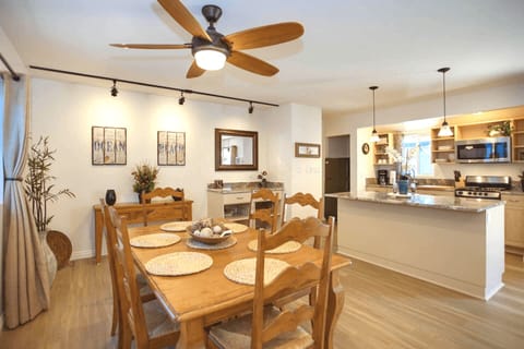 The kitchen opens out to the dining area, making meal prep a social affair!