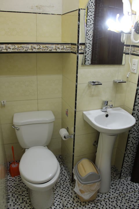 Standard Room, Multiple Beds, Non Smoking | Bathroom | Shower, rainfall showerhead, free toiletries, hair dryer