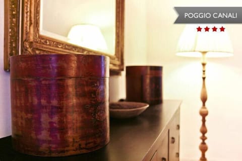 Antique linen shade with lamp stand.