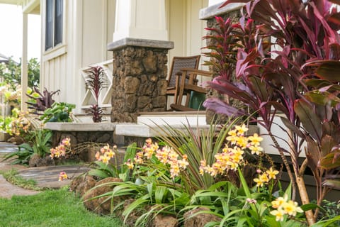 Lava rock entrance to Poipu Beach Estates Vacation Rental