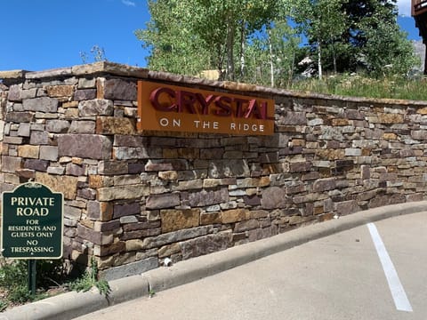 Park at any vacant spot along the Crystal stone wall.  