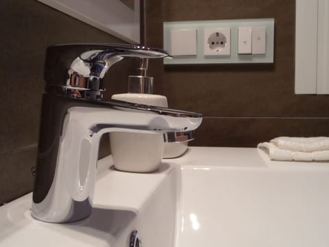 Modern bathrooms superbly appointed.