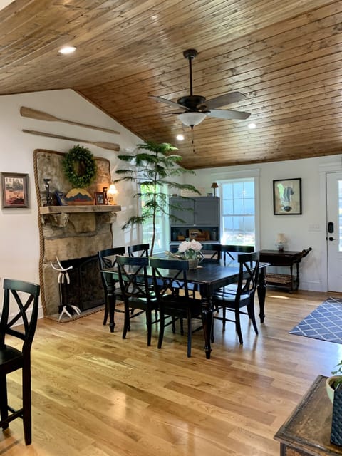Formal dining room area with original fireplace now converted to gas logs.