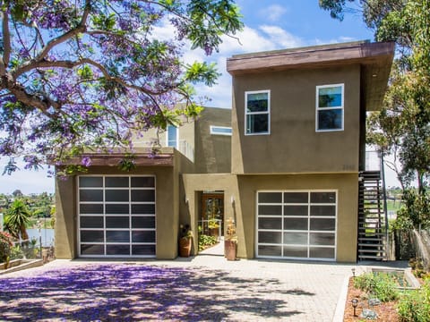 The apartment is upstairs on the right