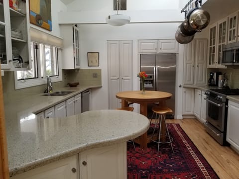 Kitchen with breakfast area oak center table