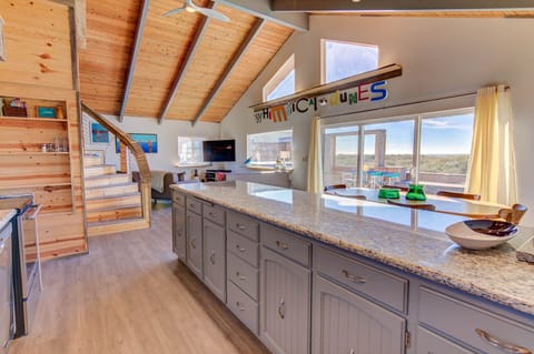 Bar top counter provides a lot of prep area and extra seating for meals.