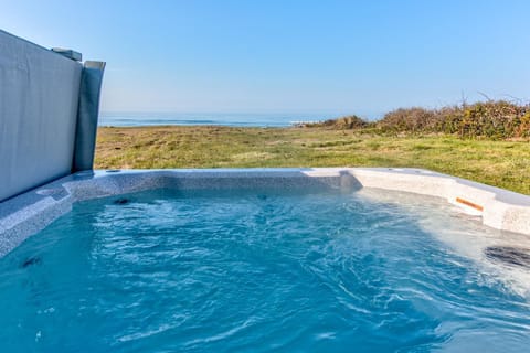 Ocean front hot tub is perfect to relax in after a day of beachcombing.