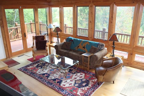 3 sides living room glass for perfect full view of river below and mountains..