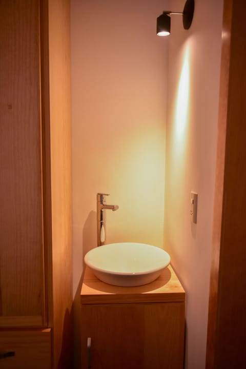 Suite, 1 King Bed, Non Smoking | Bathroom | Shower, free toiletries, towels