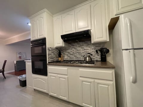 NEW Kitchen updates 2022: flooring, cabinet paint, & backsplash!