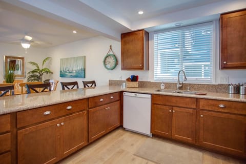 Kitchen is fully-stocked with dishes, cooking, baking and meal prep gear. All standard large and small appliances included. See listing description.