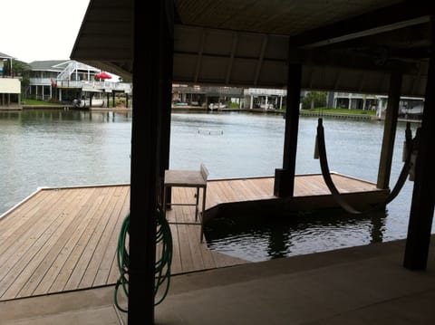 Newly installed larger dock for fishing and fish cleaning table.