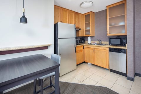 Suite, 1 Bedroom, Non Smoking | Private kitchen | Fridge, microwave, stovetop, dishwasher