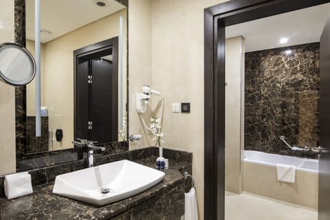 Quartz Suite | Bathroom | Shower, rainfall showerhead, hair dryer, bathrobes