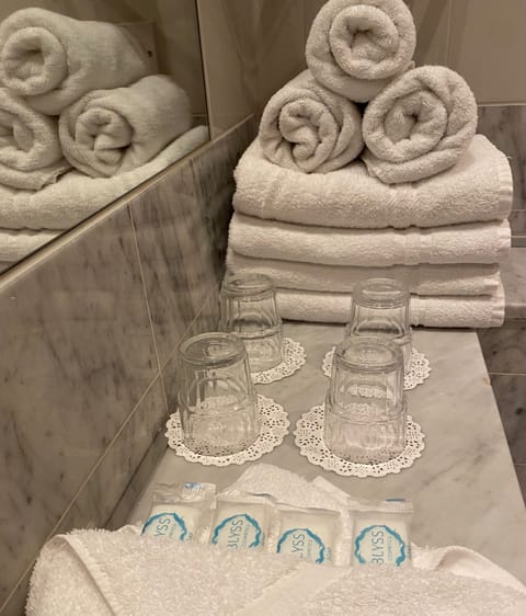 Shower, free toiletries, hair dryer, towels