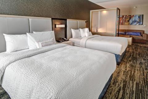 Premium bedding, down comforters, pillowtop beds, in-room safe