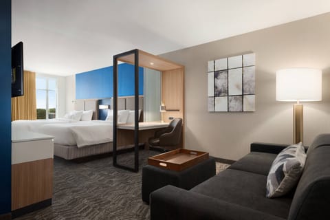 Suite, Multiple Beds, City View | Living area | LCD TV, Netflix